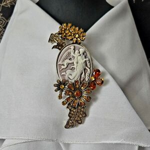 "Vintage Angel Faux Cameo Orange & Amber Rhinestones Antique Gold Tone Brooch." 